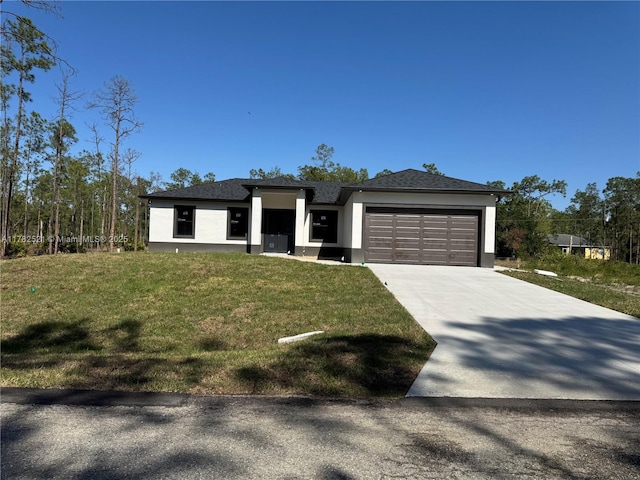 1316 Broadway Ave, Lehigh Acres, FL 33972 - prairie-style house featuring stucco siding, a garage, driveway, and a front lawn