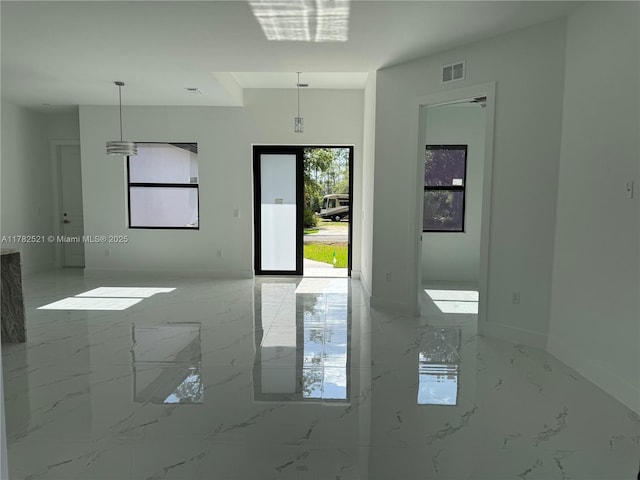 1316 Broadway Ave, Lehigh Acres, FL 33972 - unfurnished room with light marble finish flooring and baseboards