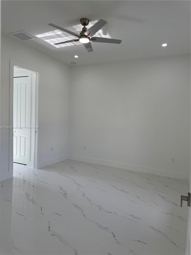 1316 Broadway Ave, Lehigh Acres, FL 33972 - empty room with a ceiling fan, baseboards, recessed lighting, and marble finish flooring