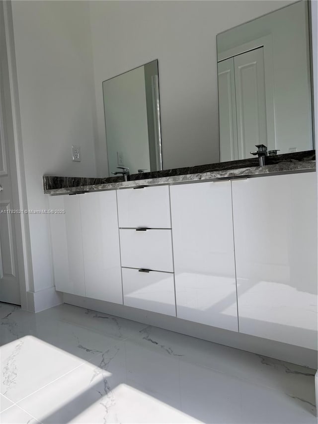 1316 Broadway Ave, Lehigh Acres, FL 33972 - bathroom with marble finish flooring and double vanity