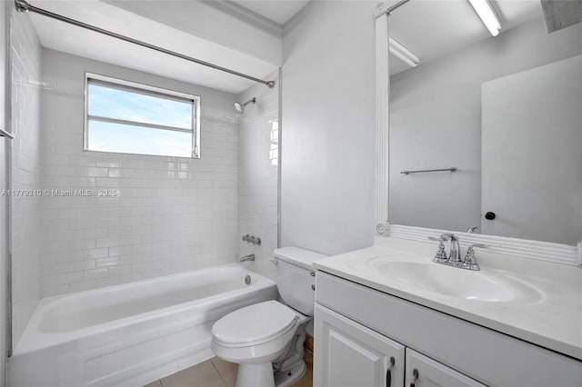 609 NE 13th Ave Unit 301, Fort Lauderdale, FL 33304 - bathroom featuring tile patterned flooring, vanity, bathtub / shower combination, and toilet