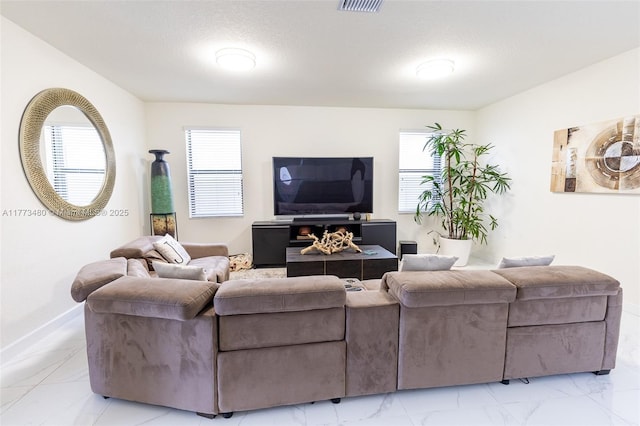 10572 W 35th Way, Hialeah, FL 33018 - living area featuring light marble finish floors and baseboards
