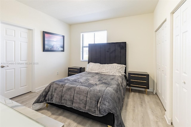10572 W 35th Way, Hialeah, FL 33018 - bedroom with light wood-type flooring and baseboards
