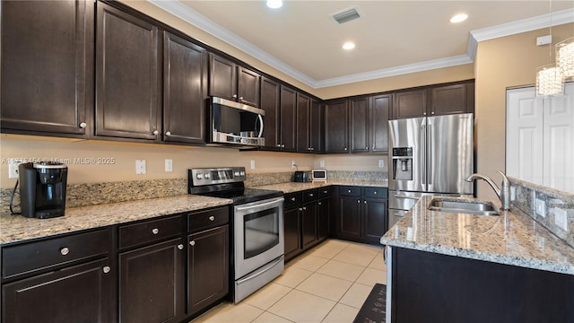 kitchen with crown molding, light tile patterned floors, light stone countertops, a sink, and stainless steel appliances