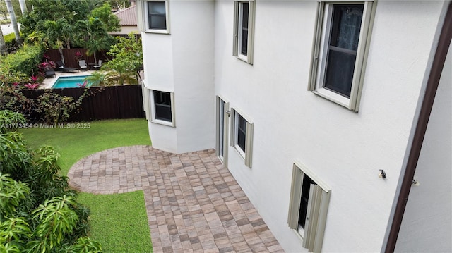 view of yard featuring a patio area and fence