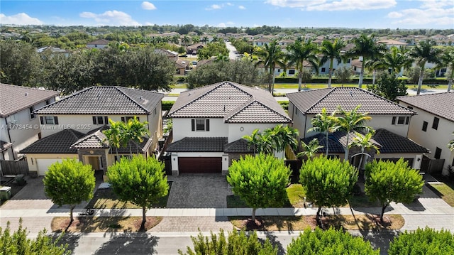birds eye view of property with a residential view
