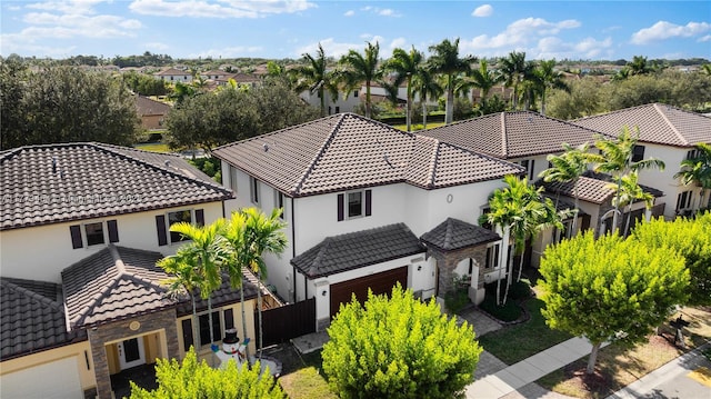 birds eye view of property with a residential view