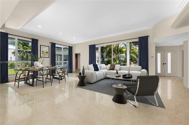 living area featuring crown molding, light tile patterned floors, a healthy amount of sunlight, and recessed lighting