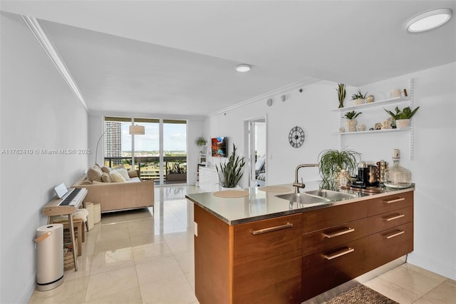 1850 S Ocean Dr Unit 1709, Hallandale Beach, FL 33009 - kitchen featuring a sink, open floor plan, crown molding, and floor to ceiling windows