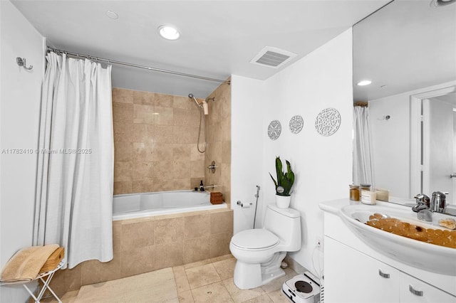 1850 S Ocean Dr Unit 1709, Hallandale Beach, FL 33009 - bathroom with visible vents, toilet, vanity, tiled shower / bath combo, and tile patterned flooring