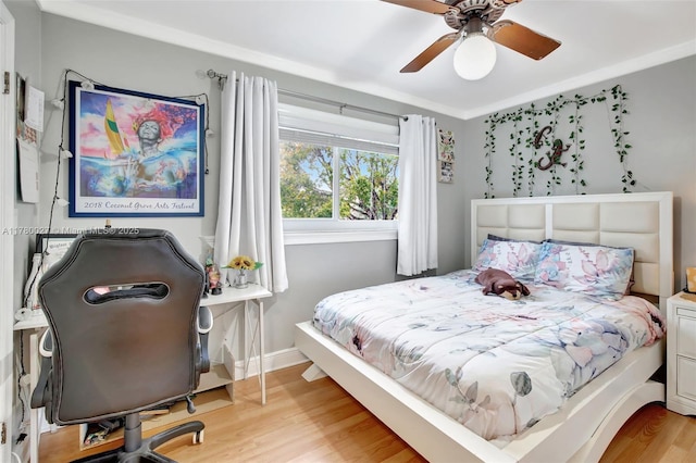1780 SW 51st Ter, Plantation, FL 33317 - bedroom with light wood finished floors, baseboards, an office area, and a ceiling fan