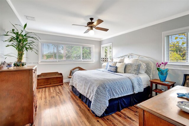 1780 SW 51st Ter, Plantation, FL 33317 - bedroom featuring ornamental molding, wood finished floors, a ceiling fan, and baseboards