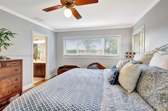 1780 SW 51st Ter, Plantation, FL 33317 - bedroom featuring wood finished floors, ornamental molding, baseboards, ensuite bathroom, and a ceiling fan