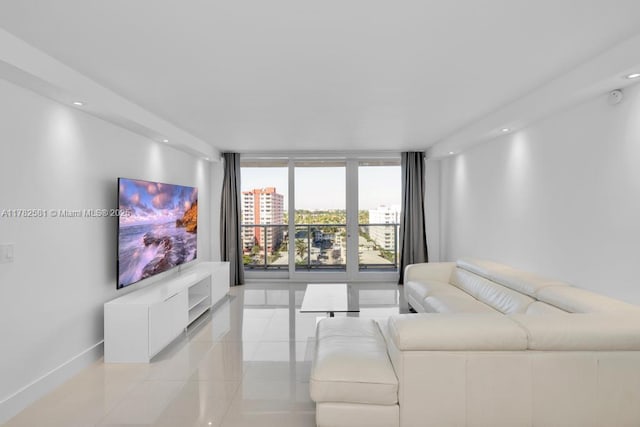 3140 S Ocean Dr Unit 1011, Hallandale Beach, FL 33009 - living area with light tile patterned floors, baseboards, recessed lighting, and floor to ceiling windows