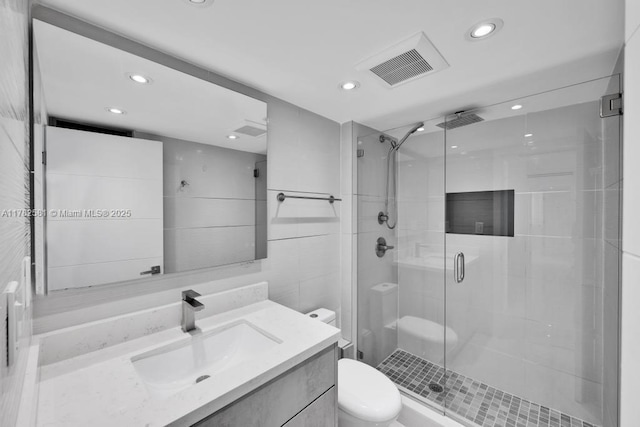 3140 S Ocean Dr Unit 1011, Hallandale Beach, FL 33009 - bathroom with vanity, recessed lighting, toilet, a shower stall, and visible vents