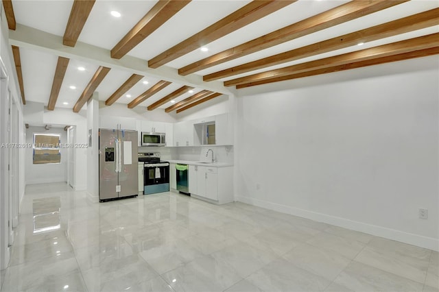 kitchen with recessed lighting, white cabinetry, stainless steel appliances, and light countertops