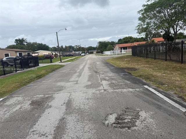 18300 NW 10th Ct, Miami Gardens, FL 33169 - view of road featuring street lights