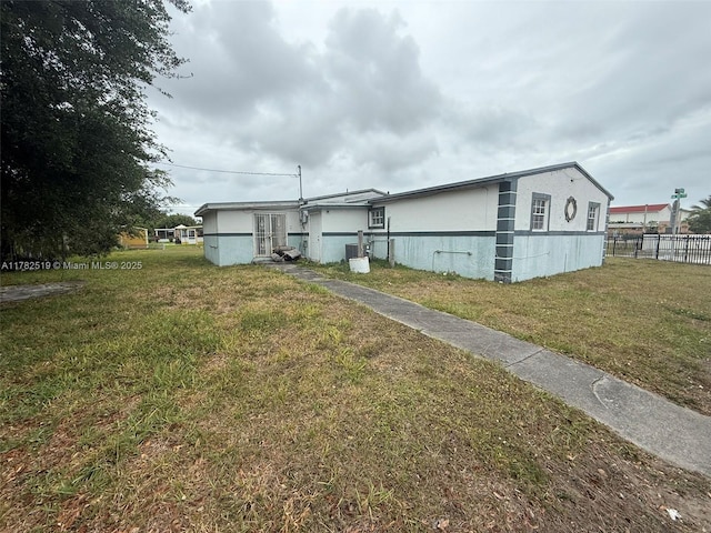 18300 NW 10th Ct, Miami Gardens, FL 33169 - exterior space with a yard and fence