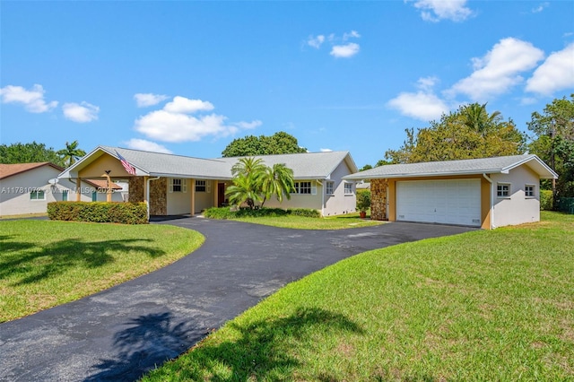 16901 SW 89th Ave, Palmetto Bay, FL 33157 - ranch-style home featuring an outdoor structure, a front yard, and stucco siding
