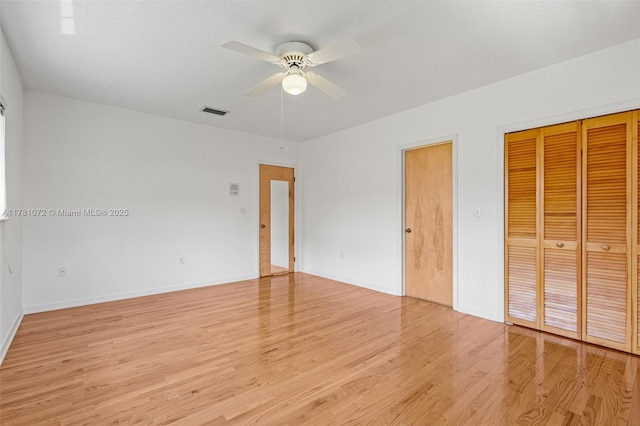 16901 SW 89th Ave, Palmetto Bay, FL 33157 - unfurnished bedroom with visible vents, light wood-type flooring, baseboards, and ceiling fan