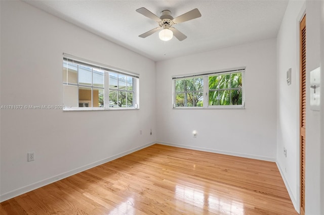 16901 SW 89th Ave, Palmetto Bay, FL 33157 - unfurnished bedroom featuring light wood-style floors, baseboards, and ceiling fan