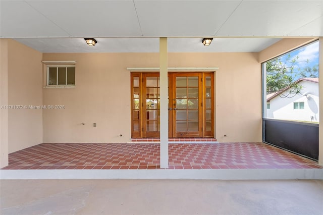 16901 SW 89th Ave, Palmetto Bay, FL 33157 - doorway to property with french doors and stucco siding