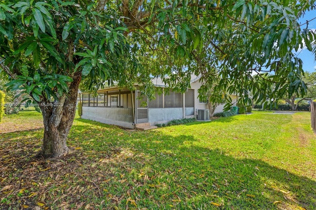 16901 SW 89th Ave, Palmetto Bay, FL 33157 - view of yard featuring a sunroom and central AC