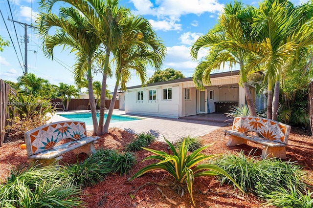 view of swimming pool with a fenced in pool, a patio, and a fenced backyard