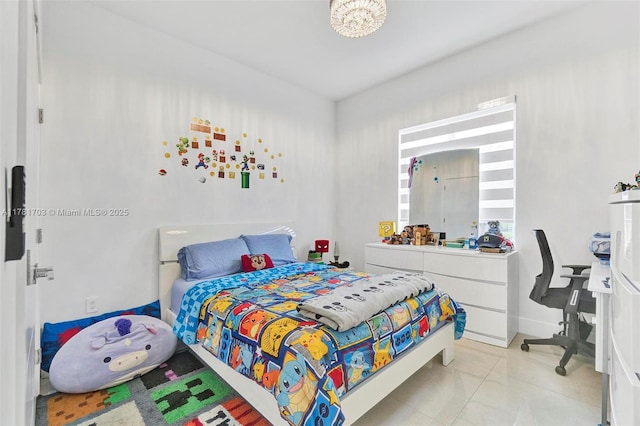 bedroom featuring light tile patterned floors