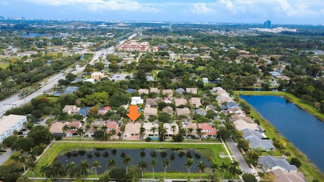 4713 Village Way, Davie, FL 33314 - aerial view of property and surrounding area with a nearby body of water and nearby suburban area