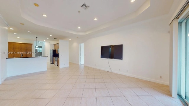 4713 Village Way, Davie, FL 33314 - unfurnished living room featuring a raised ceiling, recessed lighting, baseboards, and light tile patterned floors