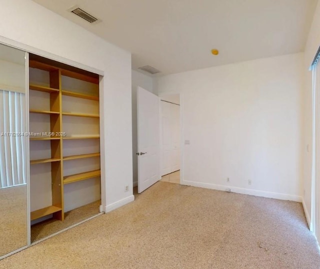 4713 Village Way, Davie, FL 33314 - unfurnished bedroom with carpet, multiple closets, and baseboards