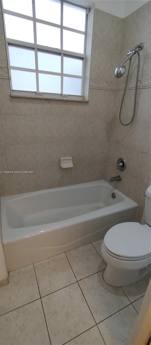 4713 Village Way, Davie, FL 33314 - full bathroom featuring shower / bath combination, tile patterned floors, and toilet