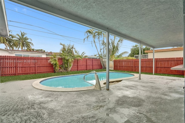 7320 Biltmore Blvd, Miramar, FL 33023 - view of swimming pool with a fenced backyard and a patio