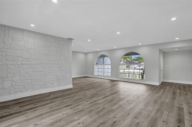 7320 Biltmore Blvd, Miramar, FL 33023 - unfurnished living room with recessed lighting, wood finished floors, and baseboards