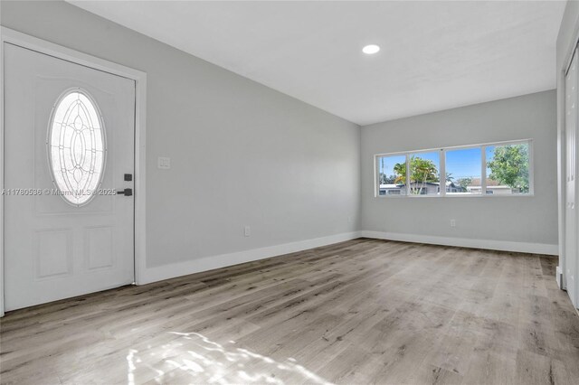 7320 Biltmore Blvd, Miramar, FL 33023 - entrance foyer featuring wood finished floors, baseboards, and recessed lighting