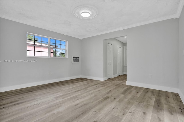 7320 Biltmore Blvd, Miramar, FL 33023 - spare room with a wall unit AC, wood finished floors, ornamental molding, and baseboards