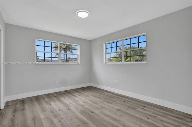 7320 Biltmore Blvd, Miramar, FL 33023 - spare room featuring wood finished floors and baseboards