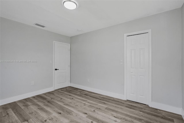 7320 Biltmore Blvd, Miramar, FL 33023 - empty room with wood finished floors and baseboards
