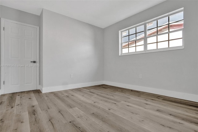 7320 Biltmore Blvd, Miramar, FL 33023 - spare room featuring wood finished floors and baseboards