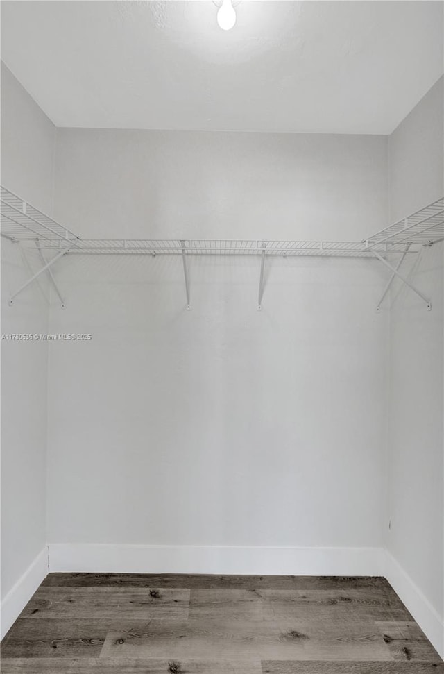 7320 Biltmore Blvd, Miramar, FL 33023 - spacious closet featuring wood finished floors