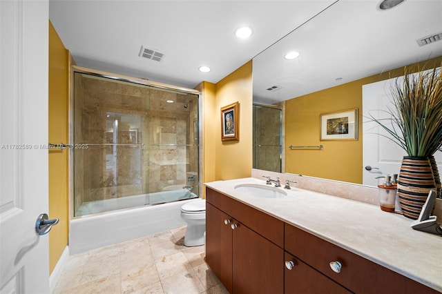 bathroom with toilet, vanity, visible vents, and recessed lighting