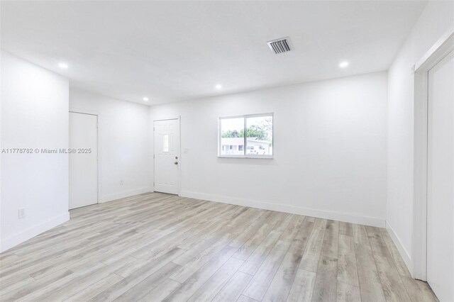 6440 SW 20th St, Miramar, FL 33023 - empty room featuring light wood-style floors, recessed lighting, and baseboards