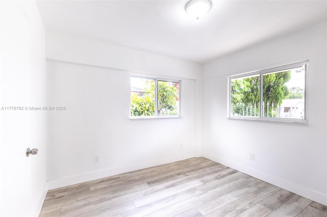 6440 SW 20th St, Miramar, FL 33023 - unfurnished room with plenty of natural light, light wood-type flooring, and baseboards