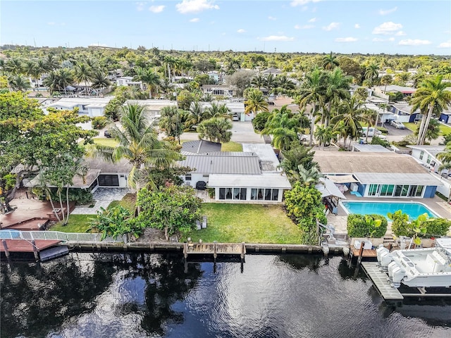 bird's eye view featuring a water view and a residential view