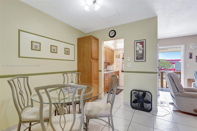 dining area with light tile patterned flooring