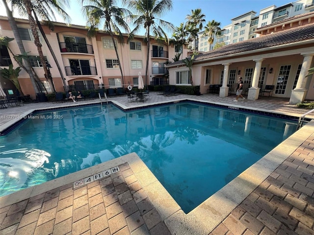 pool with a patio