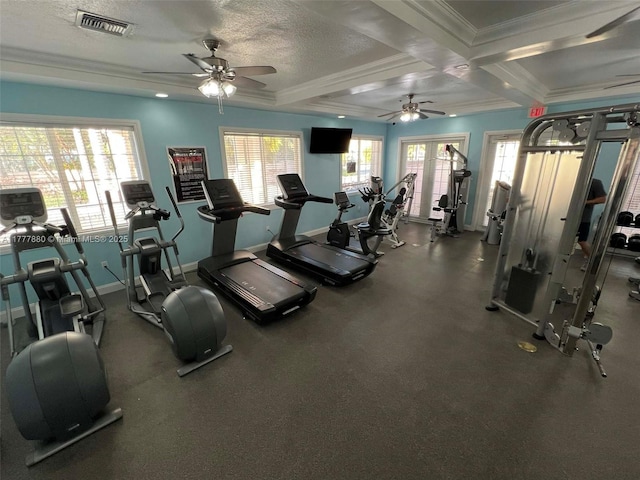 workout area with ornamental molding, a ceiling fan, visible vents, coffered ceiling, and baseboards