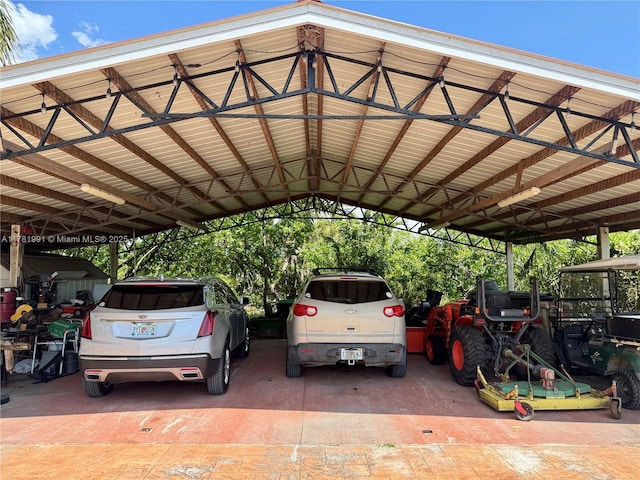 view of parking / parking lot with a carport