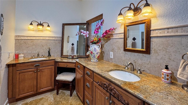 bathroom featuring vanity and backsplash